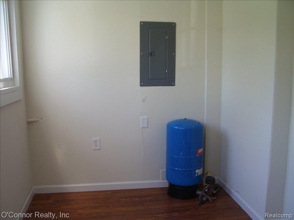 7990 Lambs Road Goodells, MI 48027 - Photo 7 of 11 7990 Lambs Road - laundry rm