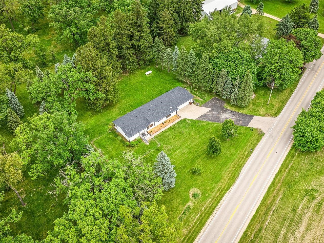 8500 Manchester Road Capron, IL 61012 - Photo 11 of 51 a view of a yard with plants