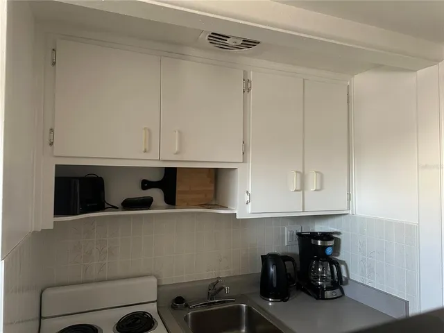 a living room filled with furniture