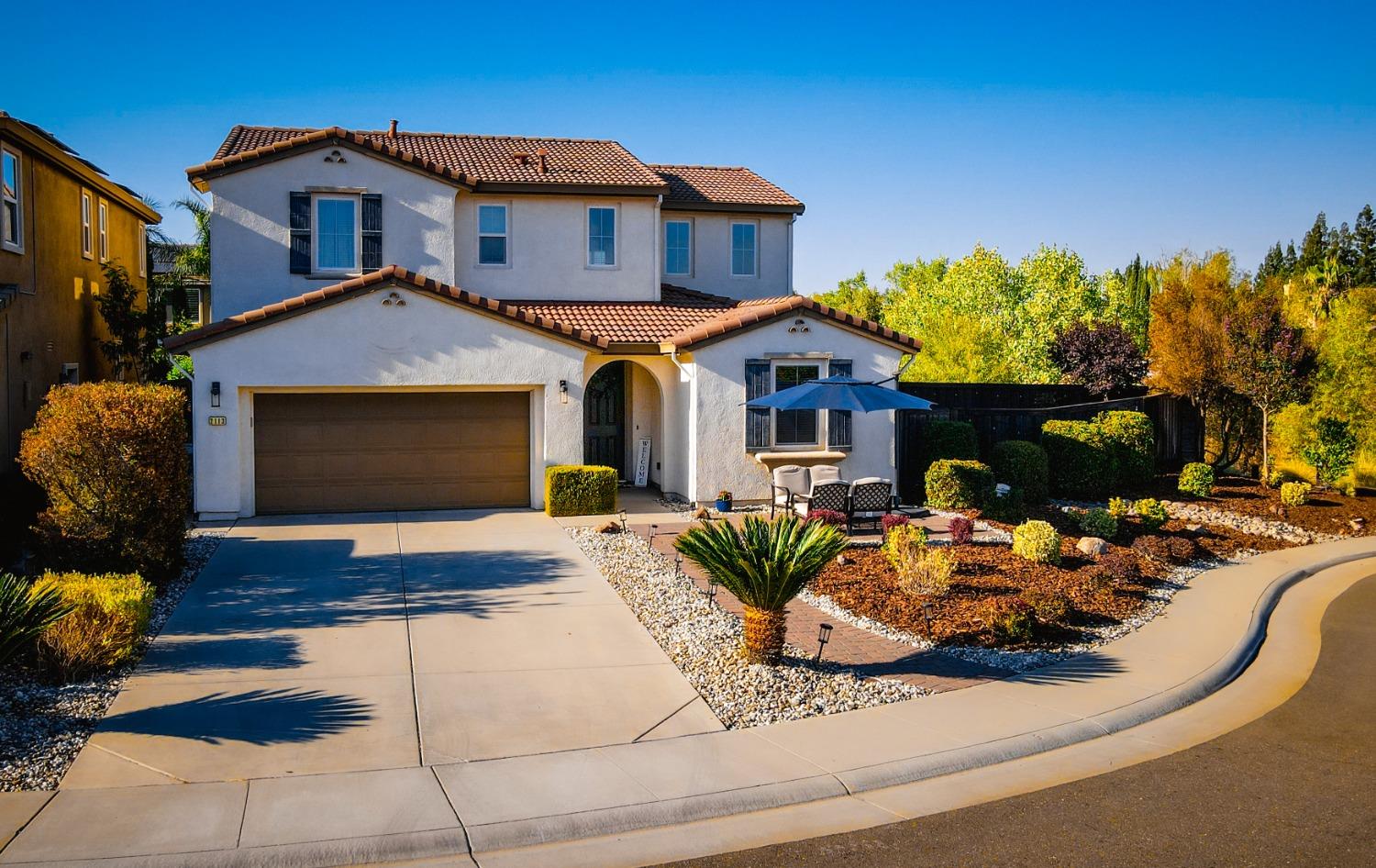 2113 Collet Court Rocklin, CA 95765 - Photo 1 of 1 a front view of a house with garden