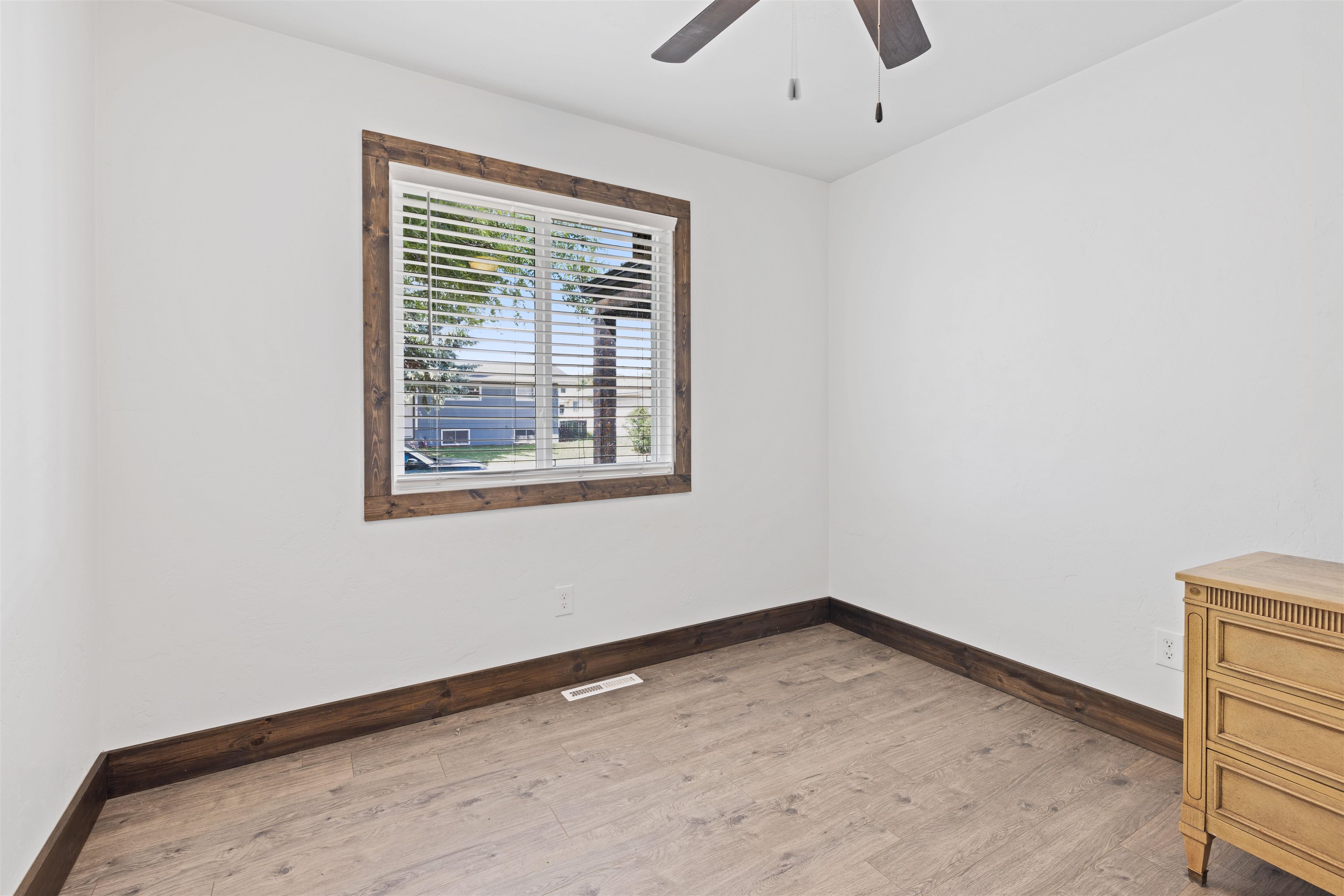 547 East 12th Street Rifle, CO 81650 - Photo 12 of 26 a view of an empty room with a window