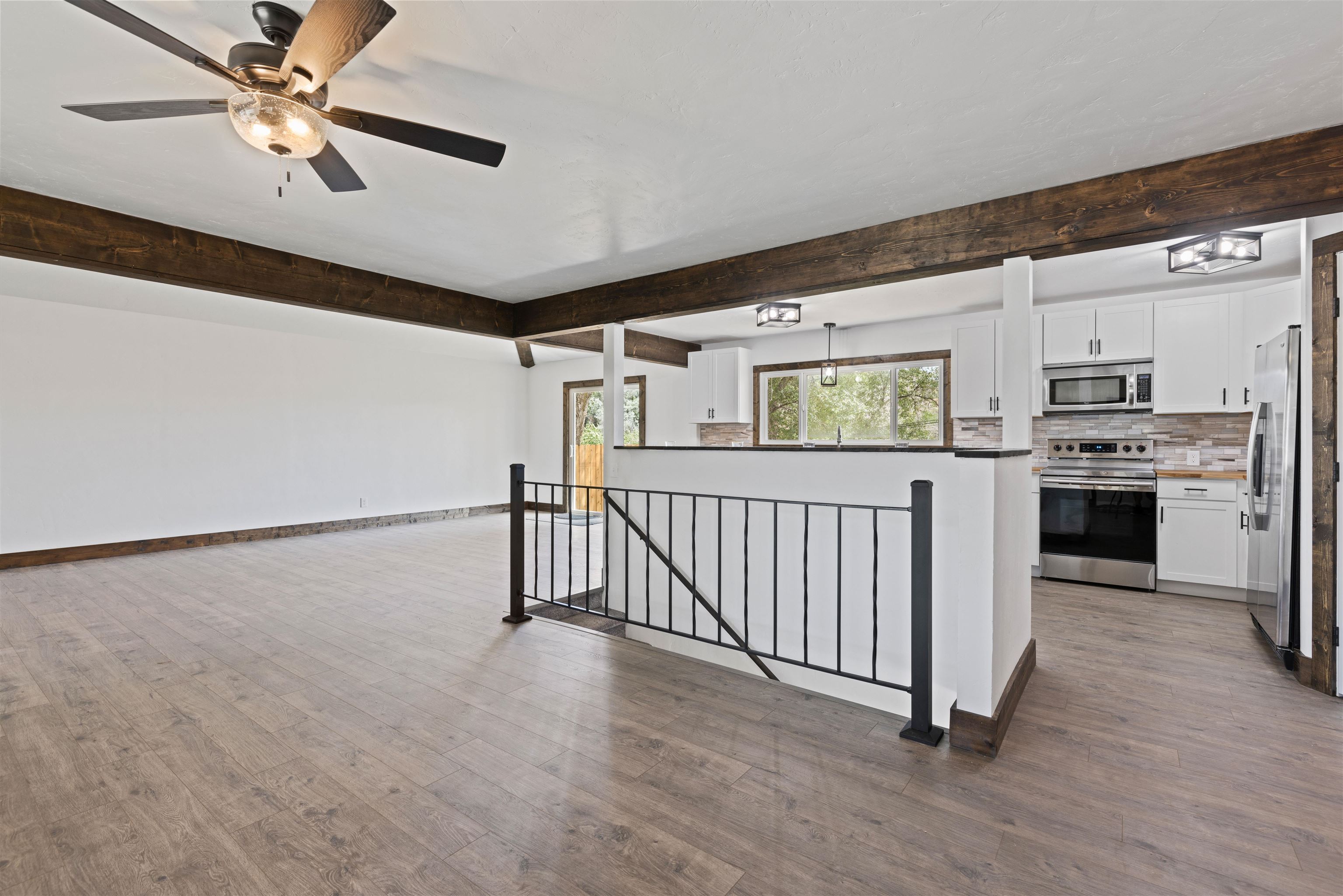 547 East 12th Street Rifle, CO 81650 - Photo 5 of 26 a view of a kitchen with electric equipment