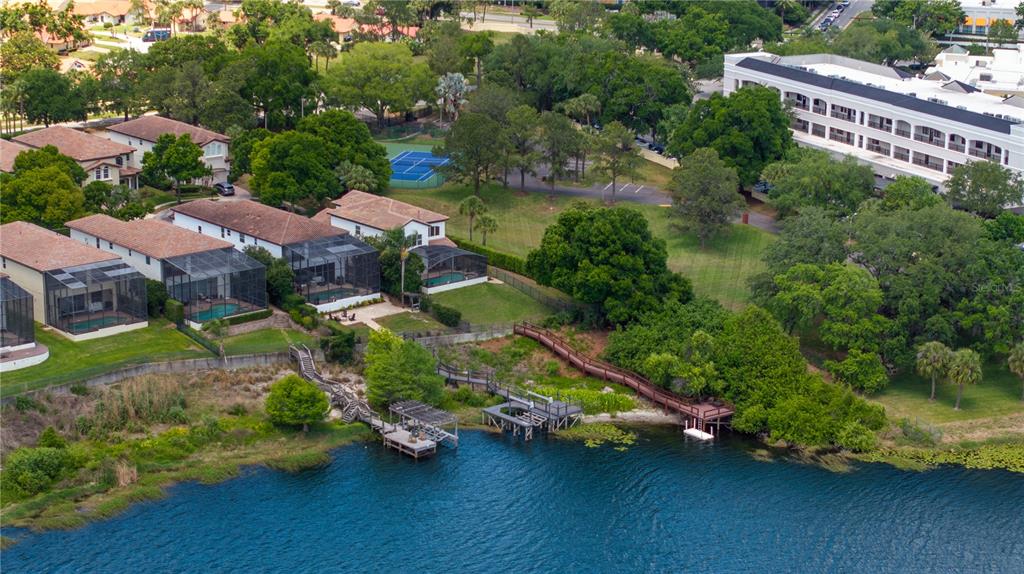 8119 Vía Rosa Orlando, FL 32836 - Photo 50 of 62 an aerial view of a house with a garden and lake view