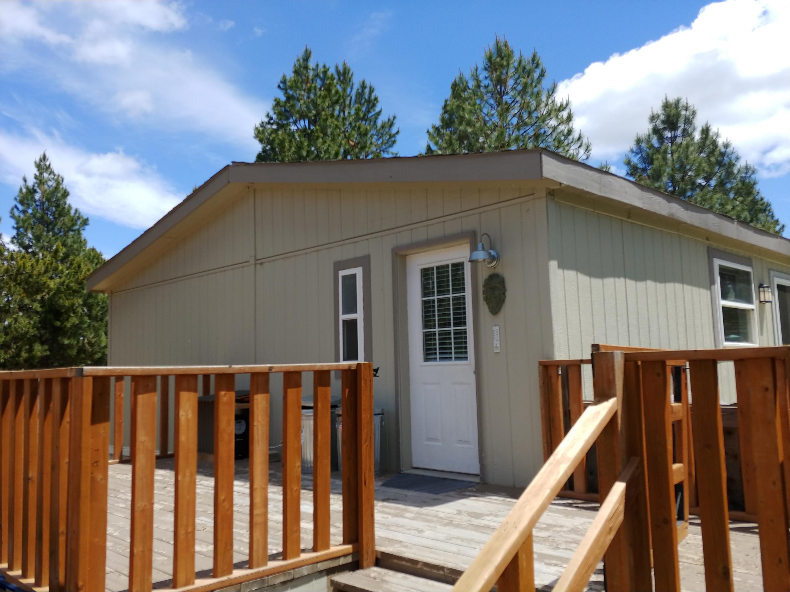 19135 Rustic Canyon Road Bend, OR 97702 - Photo 27 of 30 Side entry to and deck