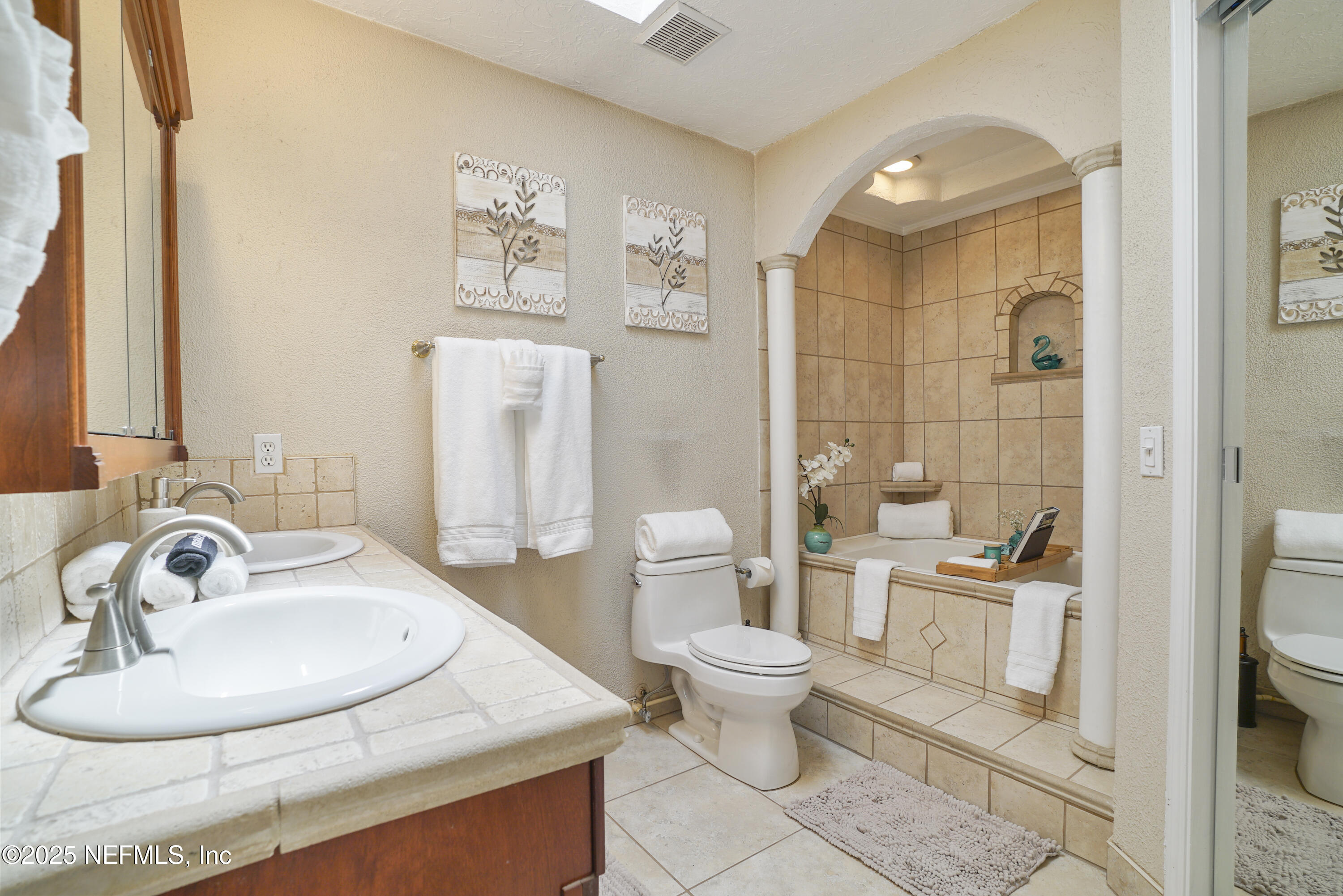 4041 Pine Run Circle St. Augustine, FL 32086 - Photo 14 of 57 a bathroom with a sink toilet and shower