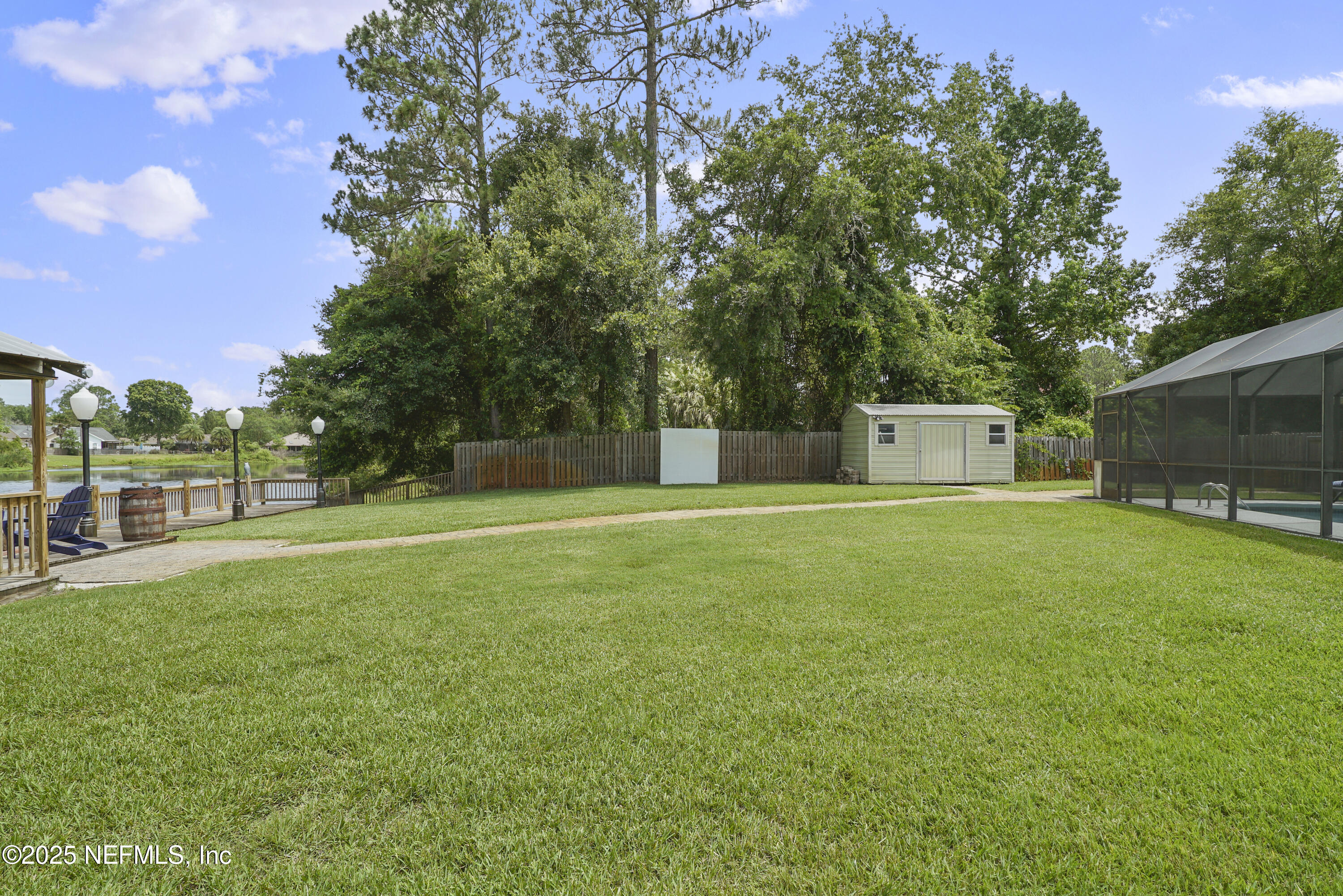 4041 Pine Run Circle St. Augustine, FL 32086 - Photo 20 of 57 a house view with a garden space