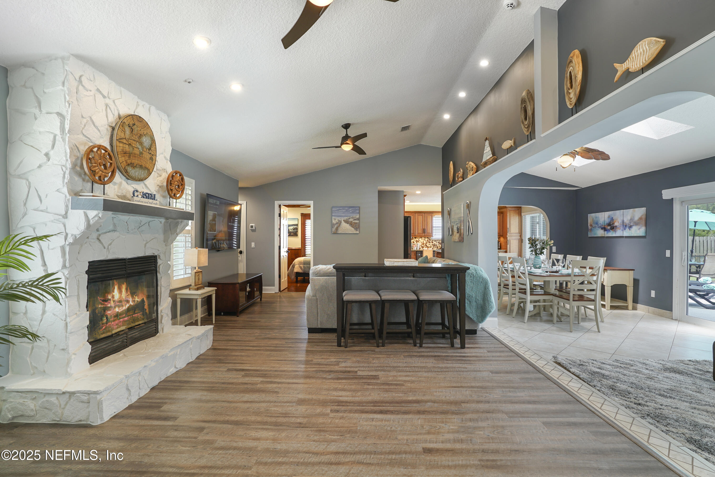 4041 Pine Run Circle St. Augustine, FL 32086 - Photo 29 of 57 a living room with furniture and a fireplace