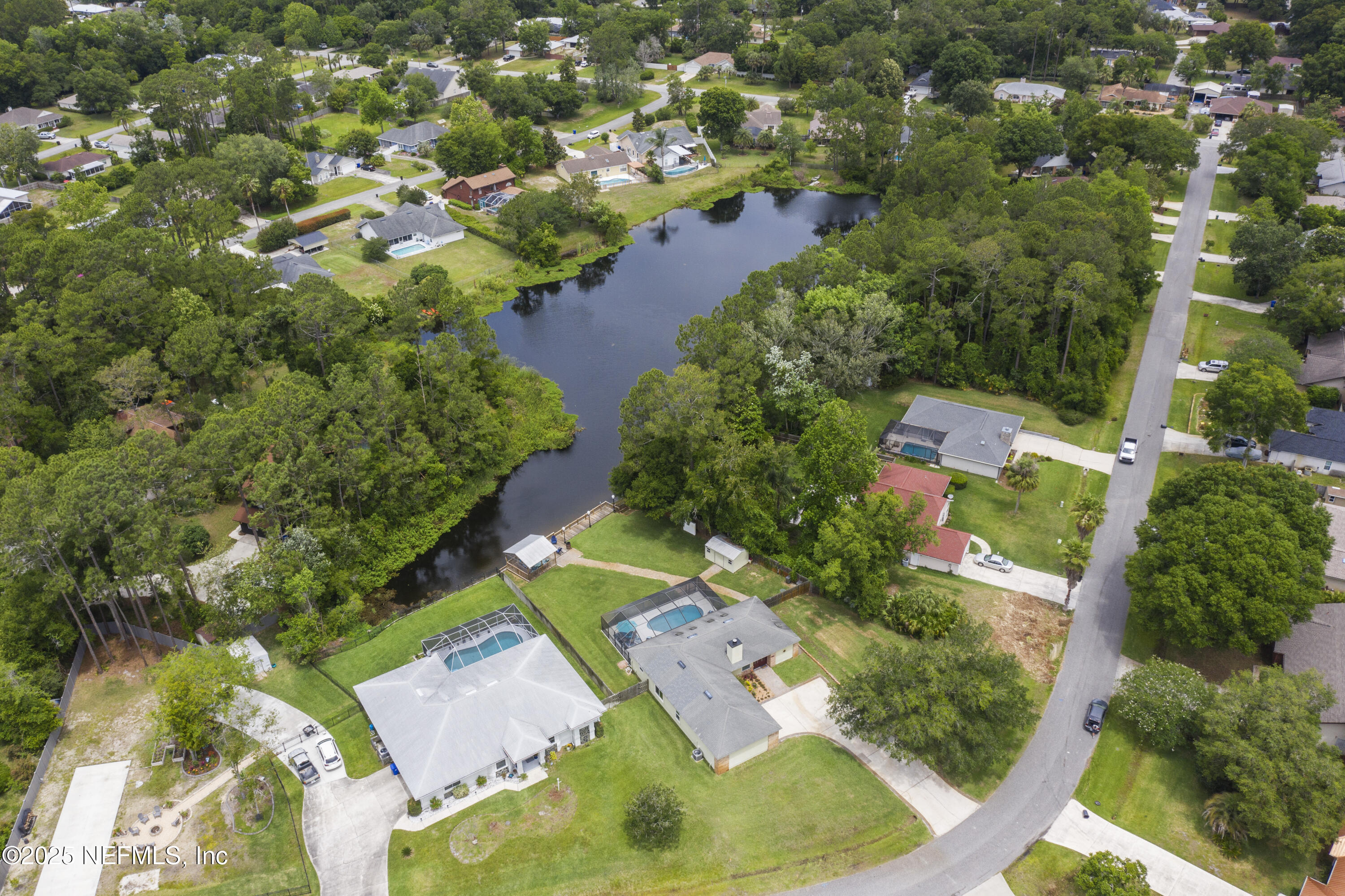 4041 Pine Run Circle St. Augustine, FL 32086 - Photo 3 of 57 an aerial view of residential houses with outdoor space and trees