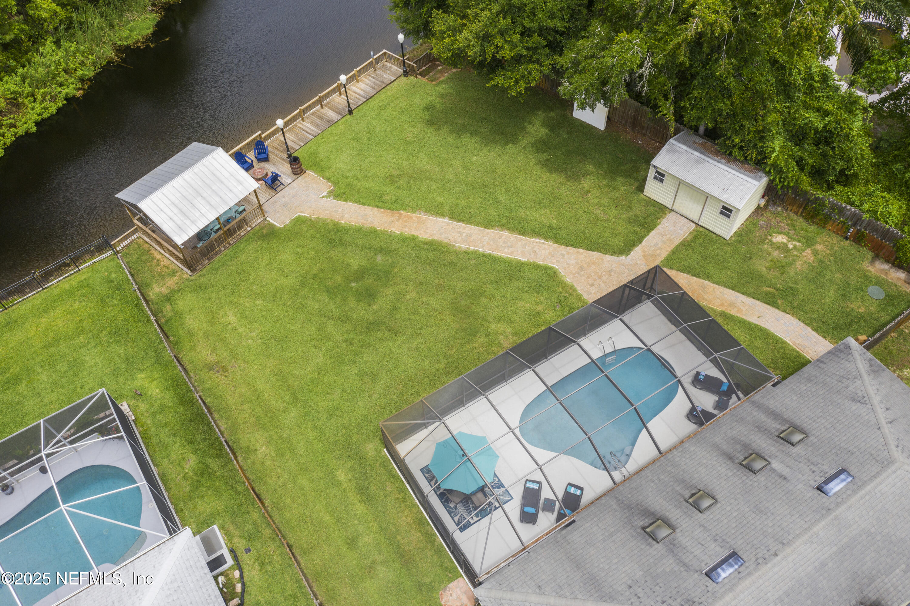 4041 Pine Run Circle St. Augustine, FL 32086 - Photo 4 of 57 an aerial view of a house with garden space and street view