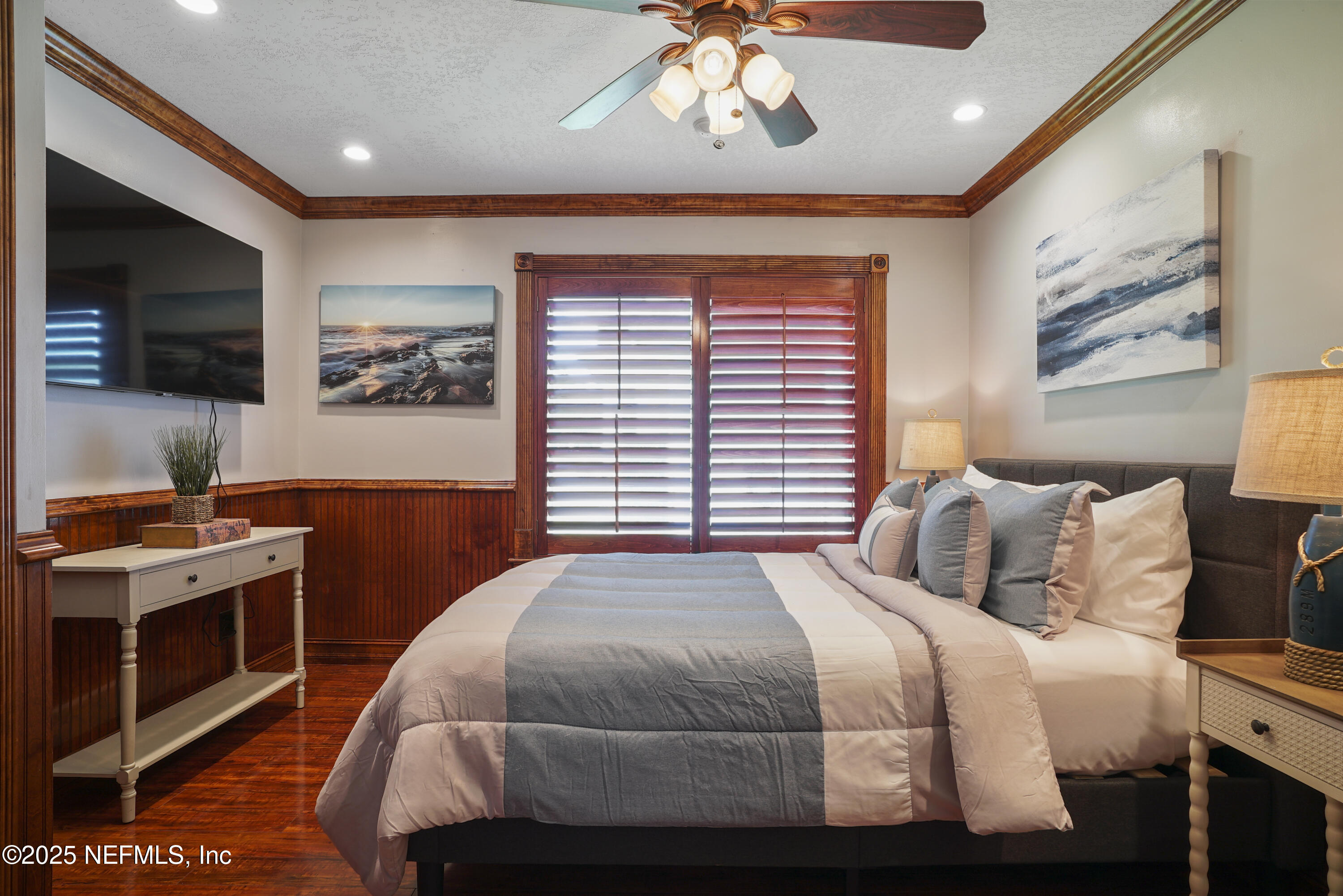 4041 Pine Run Circle St. Augustine, FL 32086 - Photo 44 of 57 a bedroom with a bed and a flat screen tv