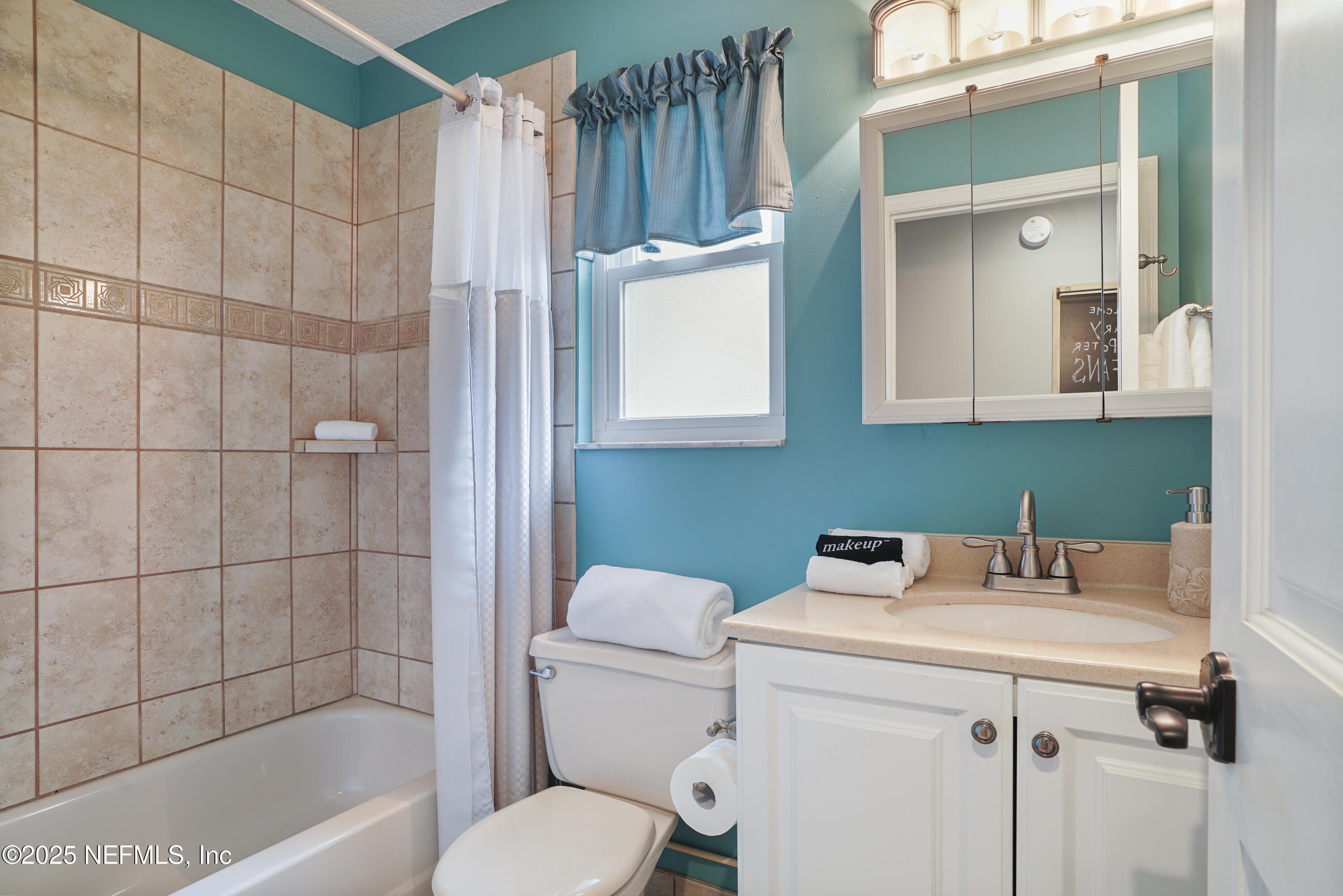 4041 Pine Run Circle St. Augustine, FL 32086 - Photo 47 of 57 a bathroom with a sink toilet and shower