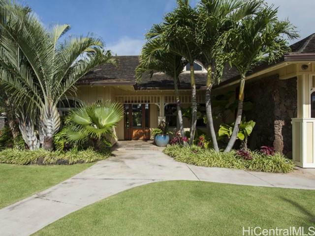341 Portlock Road Honolulu, HI 96825 - Photo 1 of 1 a front view of a house having yard