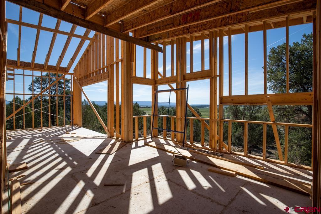 149 Rustic Ridge Ignacio, CO 81137 - Photo 9 of 13 a view of balcony with couch