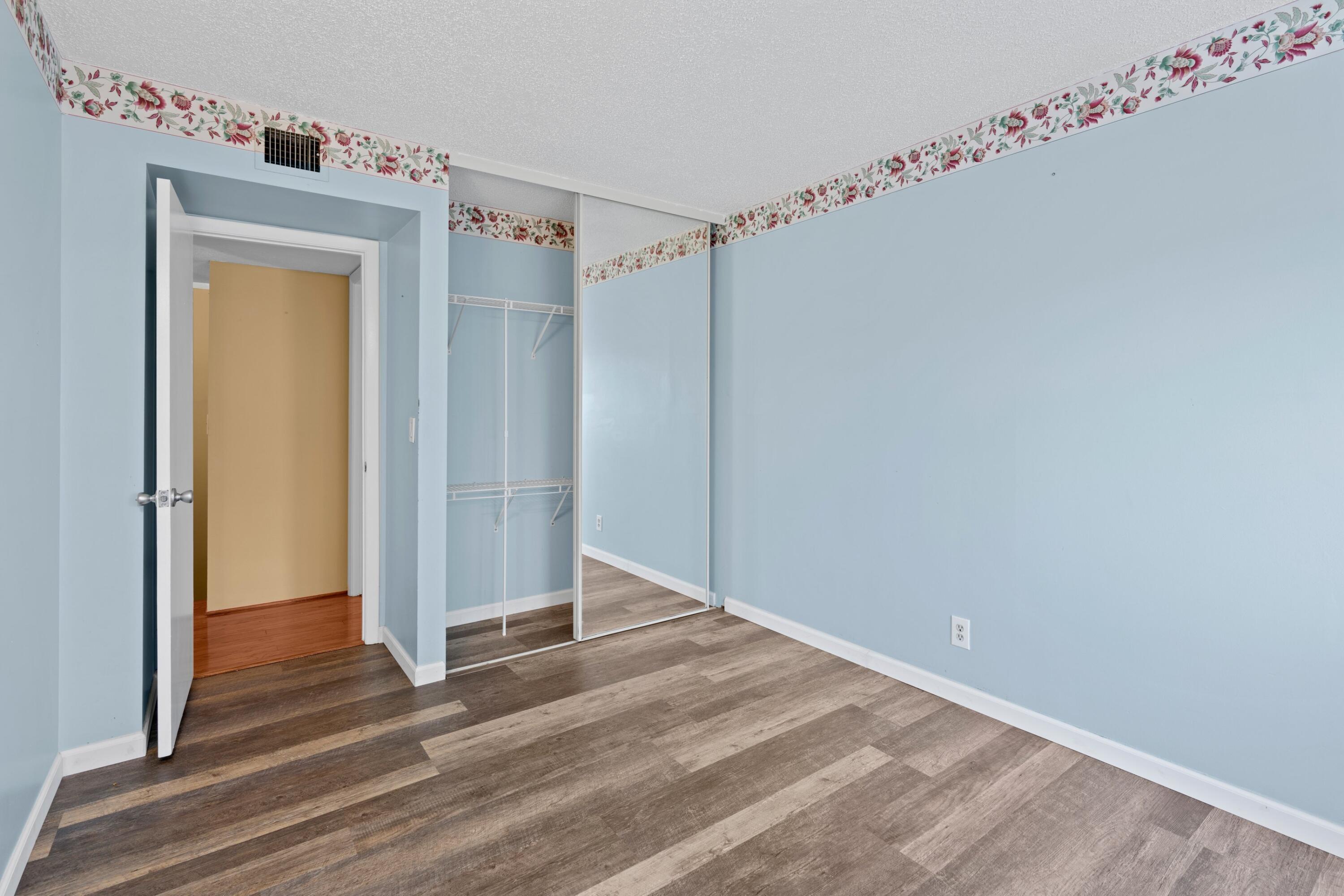109 Woodland Road Palm Springs, FL 33461 - Photo 14 of 20 a view of an empty room