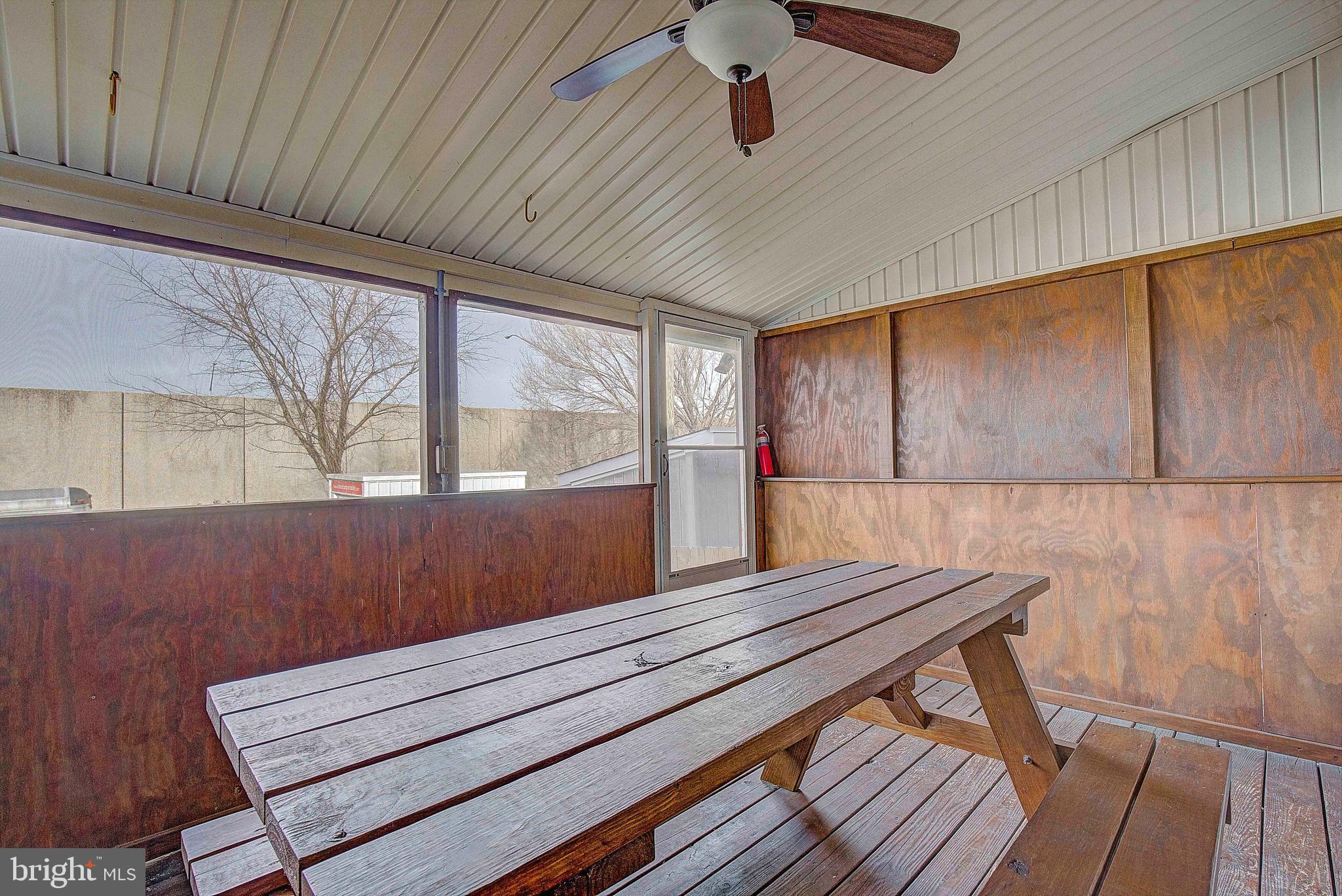 510 Old Riverside Road Brooklyn Park, MD 21225 - Photo 31 of 36 Enclosed back porch