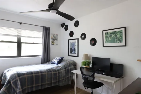 a view of workspace with wooden floor