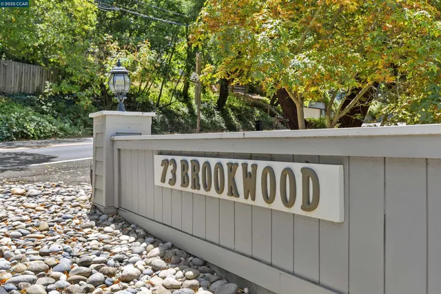 a view of a wooden fence