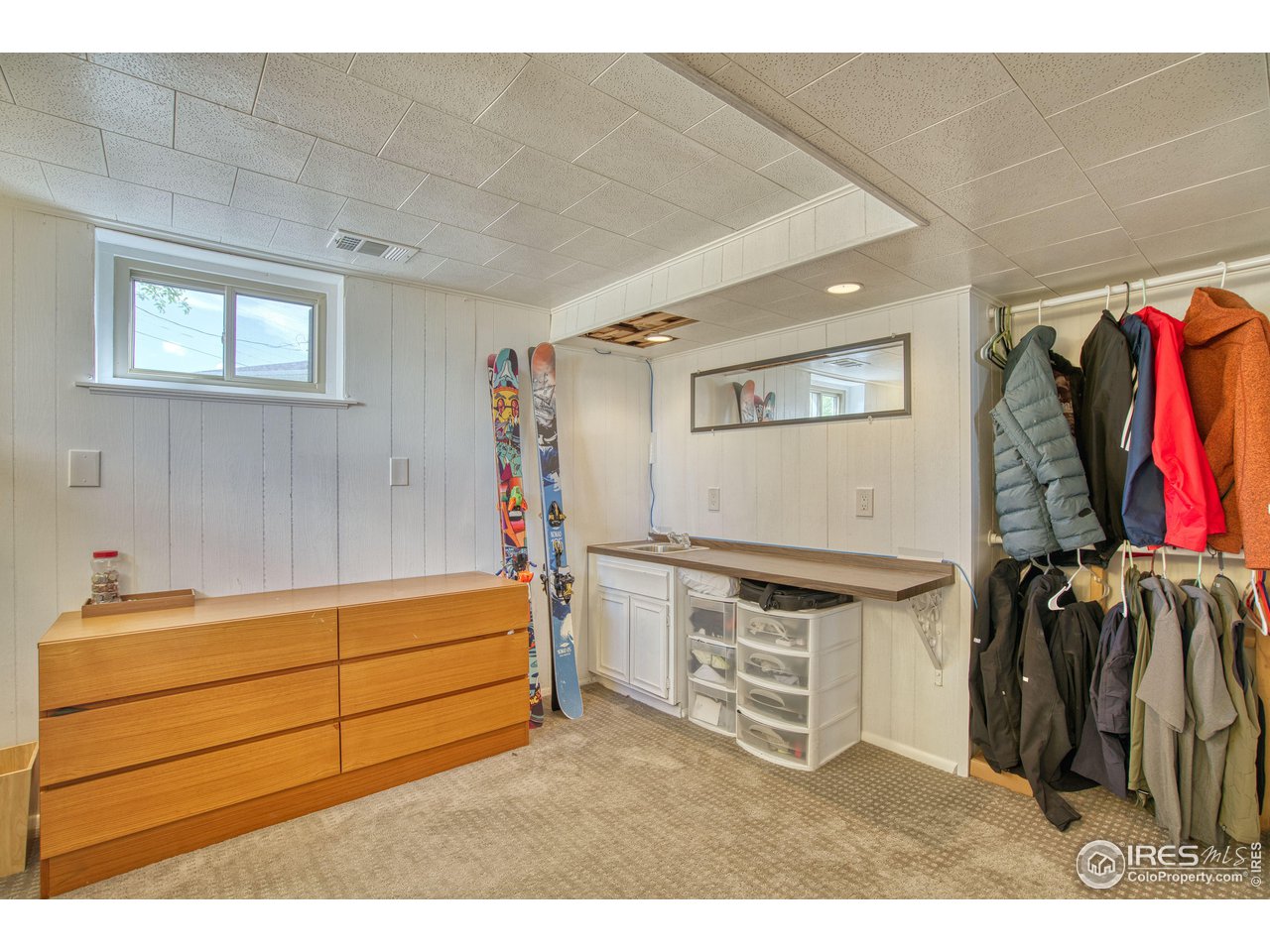 101 6th Street Frederick, CO 80530 - Photo 28 of 35 a room with furniture and a window