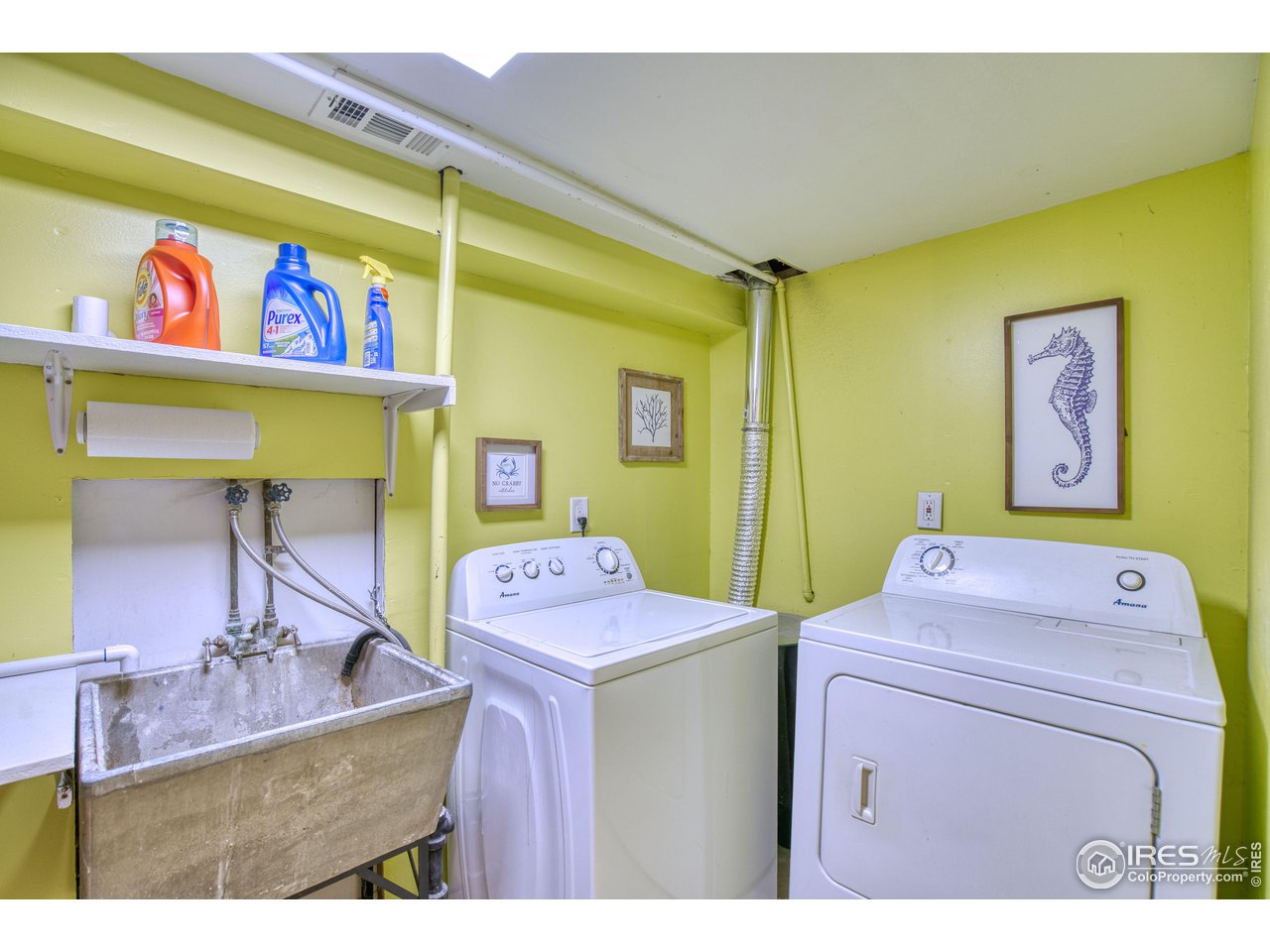101 6th Street Frederick, CO 80530 - Photo 33 of 35 a utility room with dryer and washer