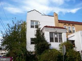 6991 Clinton Road Upper Darby, PA 19082 - Photo 1 of 1 a front view of a house with a garden