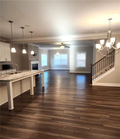 a view of a kitchen and dining room
