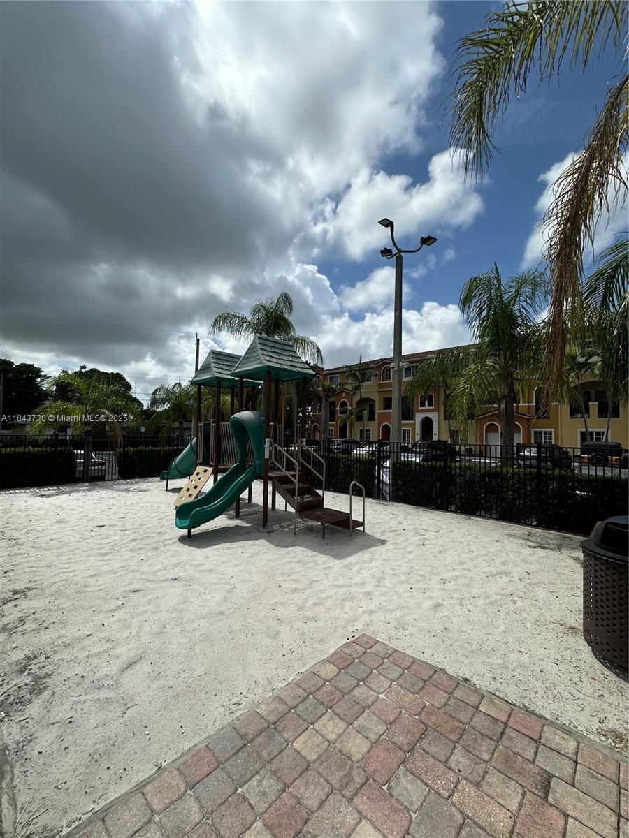 141 Northwest 2nd Avenue, Unit 2 Hallandale Beach, FL 33009 - Photo 20 of 21 a view of street with sitting area
