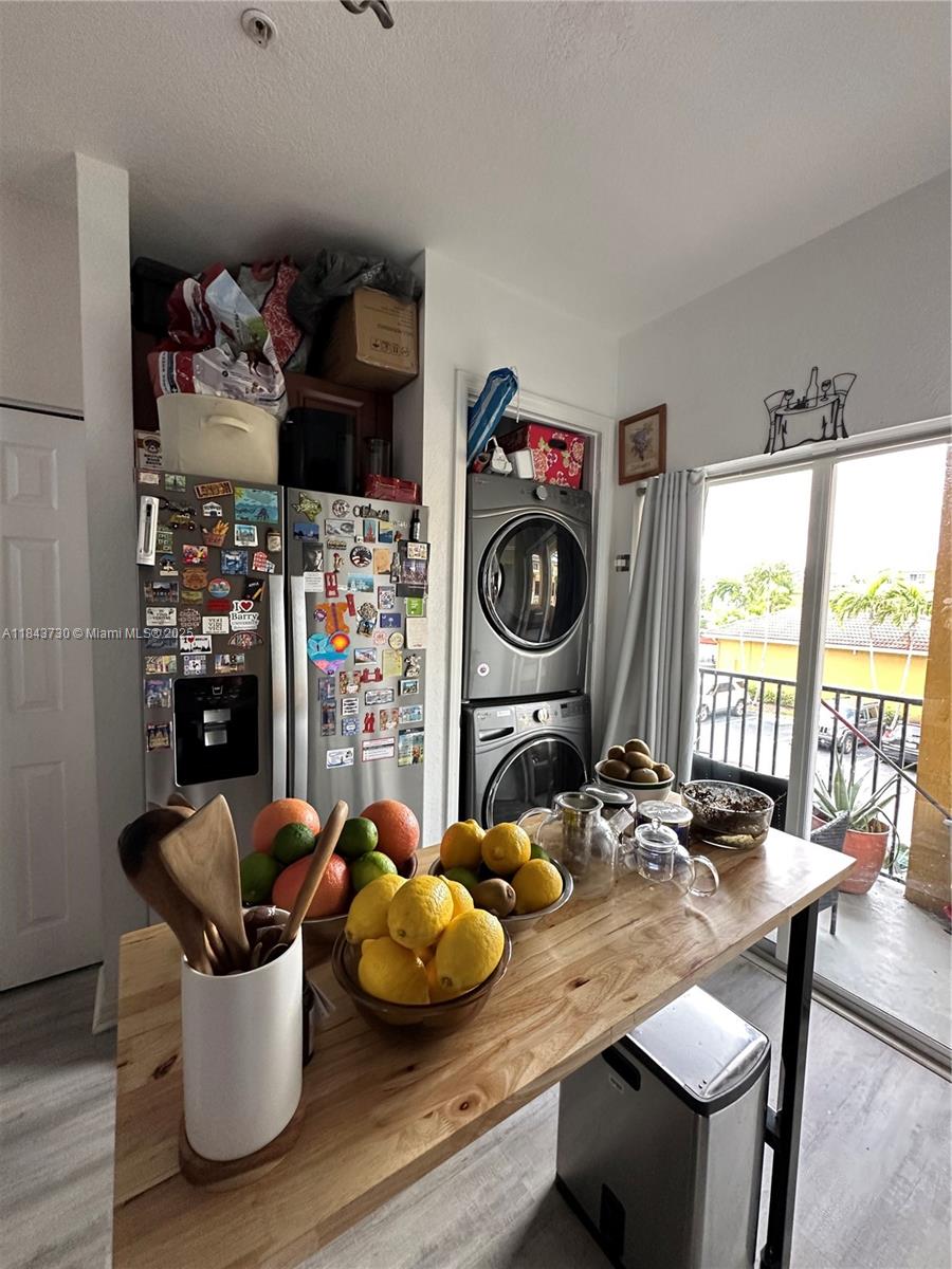 141 Northwest 2nd Avenue, Unit 2 Hallandale Beach, FL 33009 - Photo 5 of 21 a view of a dining room with furniture and a window