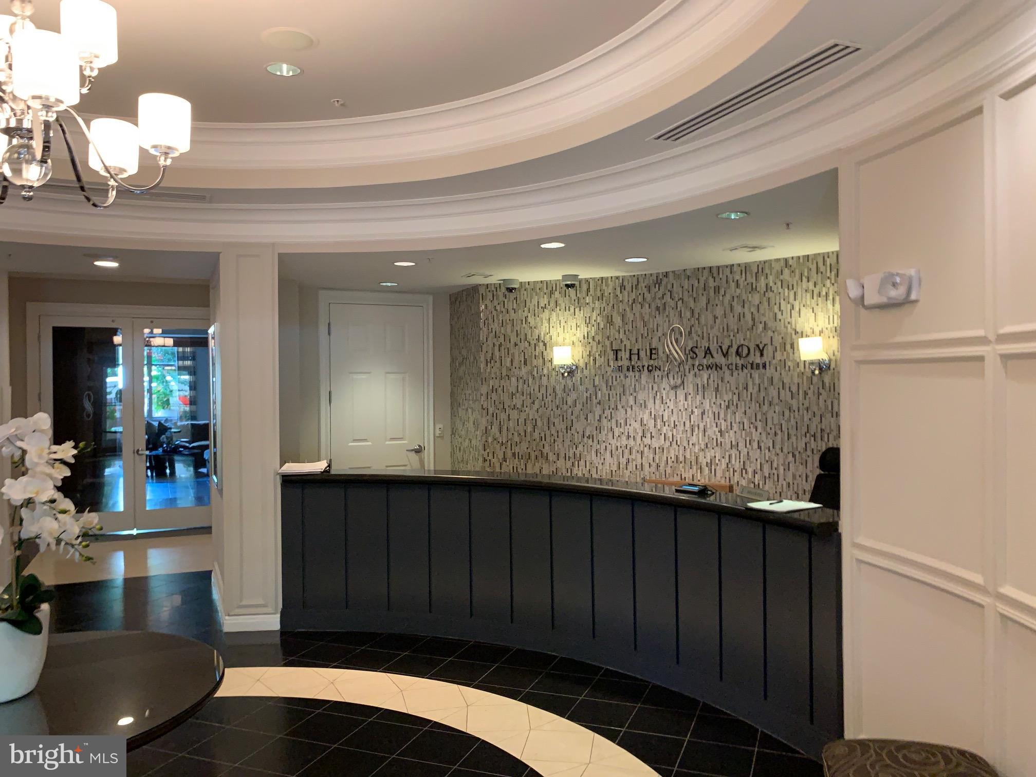 12000 Market Street, Unit 483 Reston, VA 20190 - Photo 3 of 36 Concierge and onsite management. People to help!