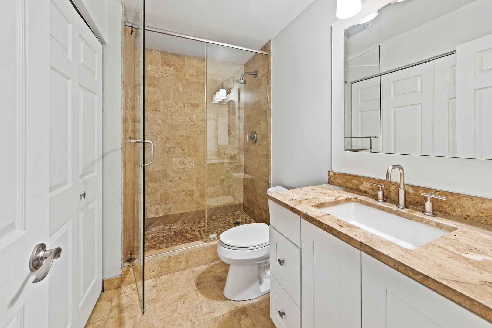 780 South Federal Street, Unit 407 Chicago, IL 60605 - Photo 16 of 20 a bathroom with a granite countertop sink a toilet and shower