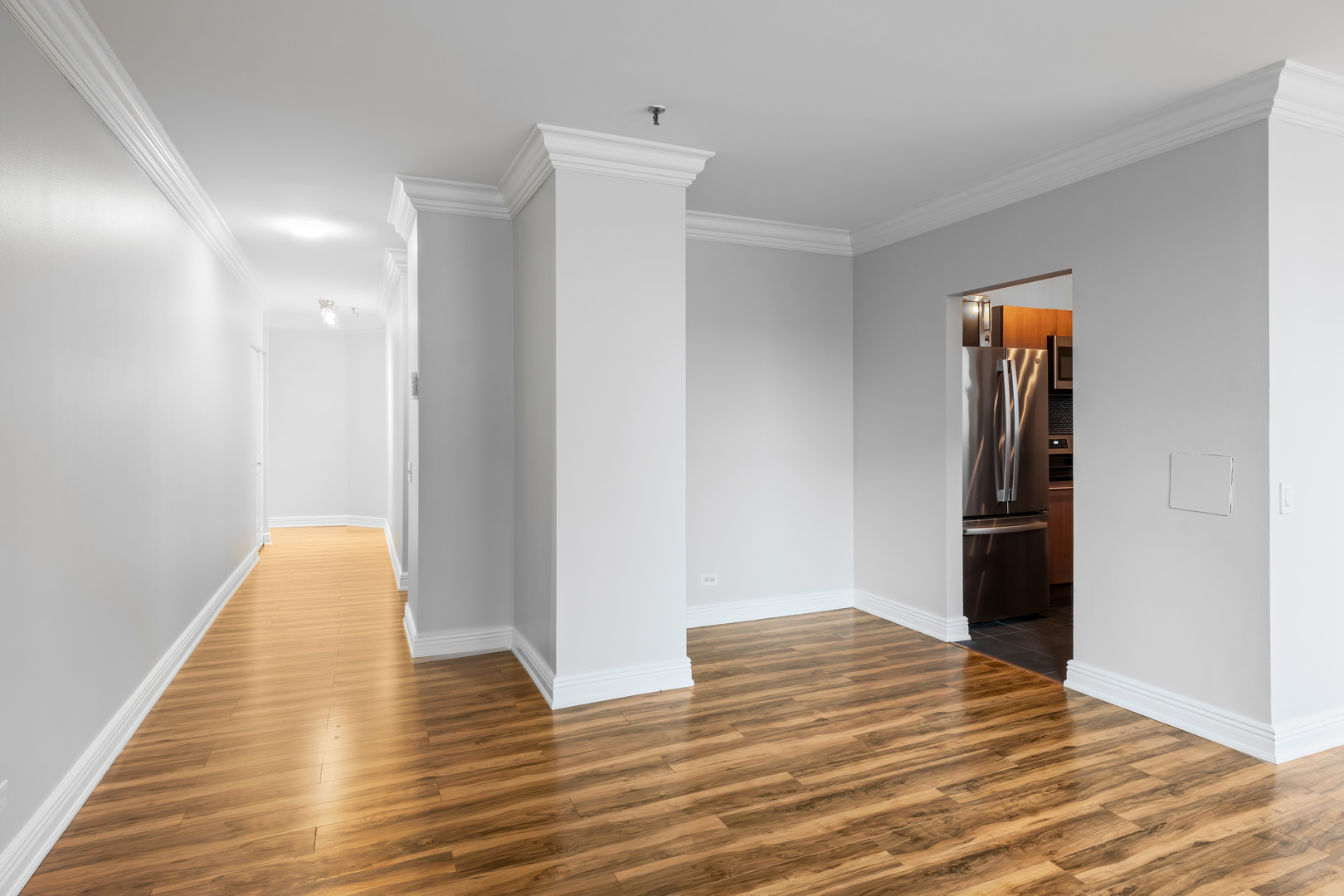 780 South Federal Street, Unit 407 Chicago, IL 60605 - Photo 6 of 20 a view of empty room with wooden floor