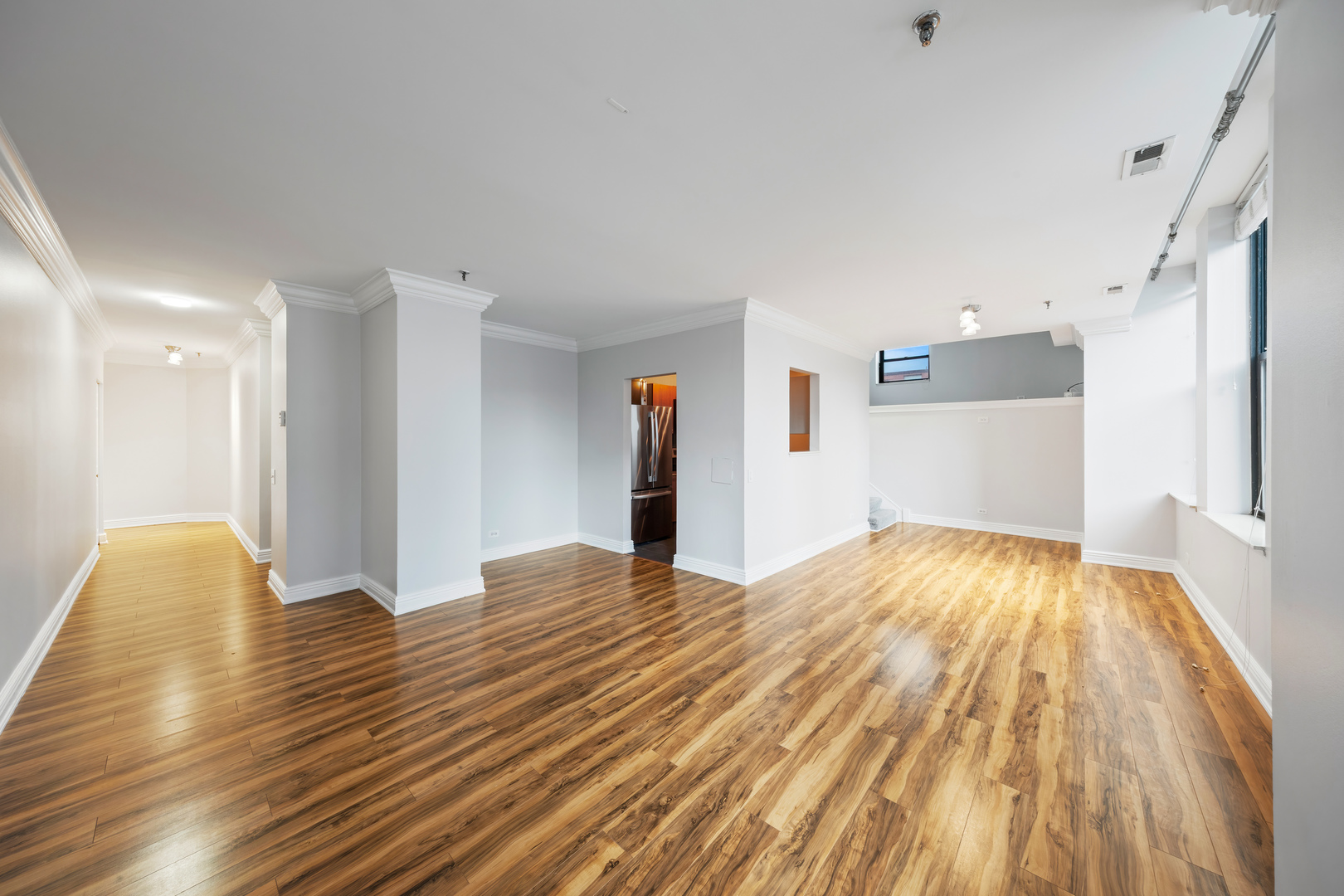 780 South Federal Street, Unit 407 Chicago, IL 60605 - Photo 7 of 20 a view of empty room with wooden floor