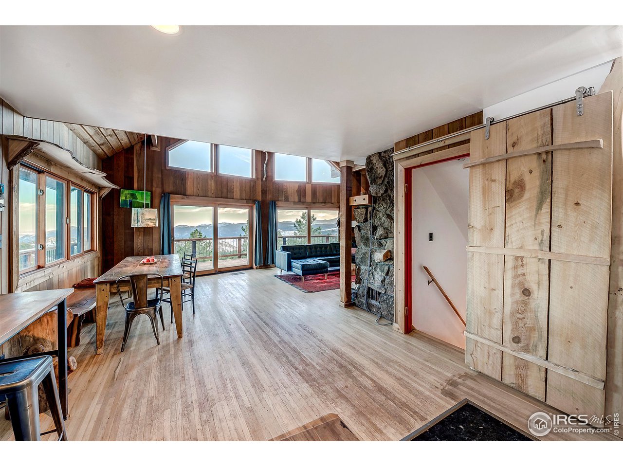 1048 Dixon Road Boulder, CO 80302 - Photo 17 of 39 a view of a livingroom with furniture hardwood floor and a window