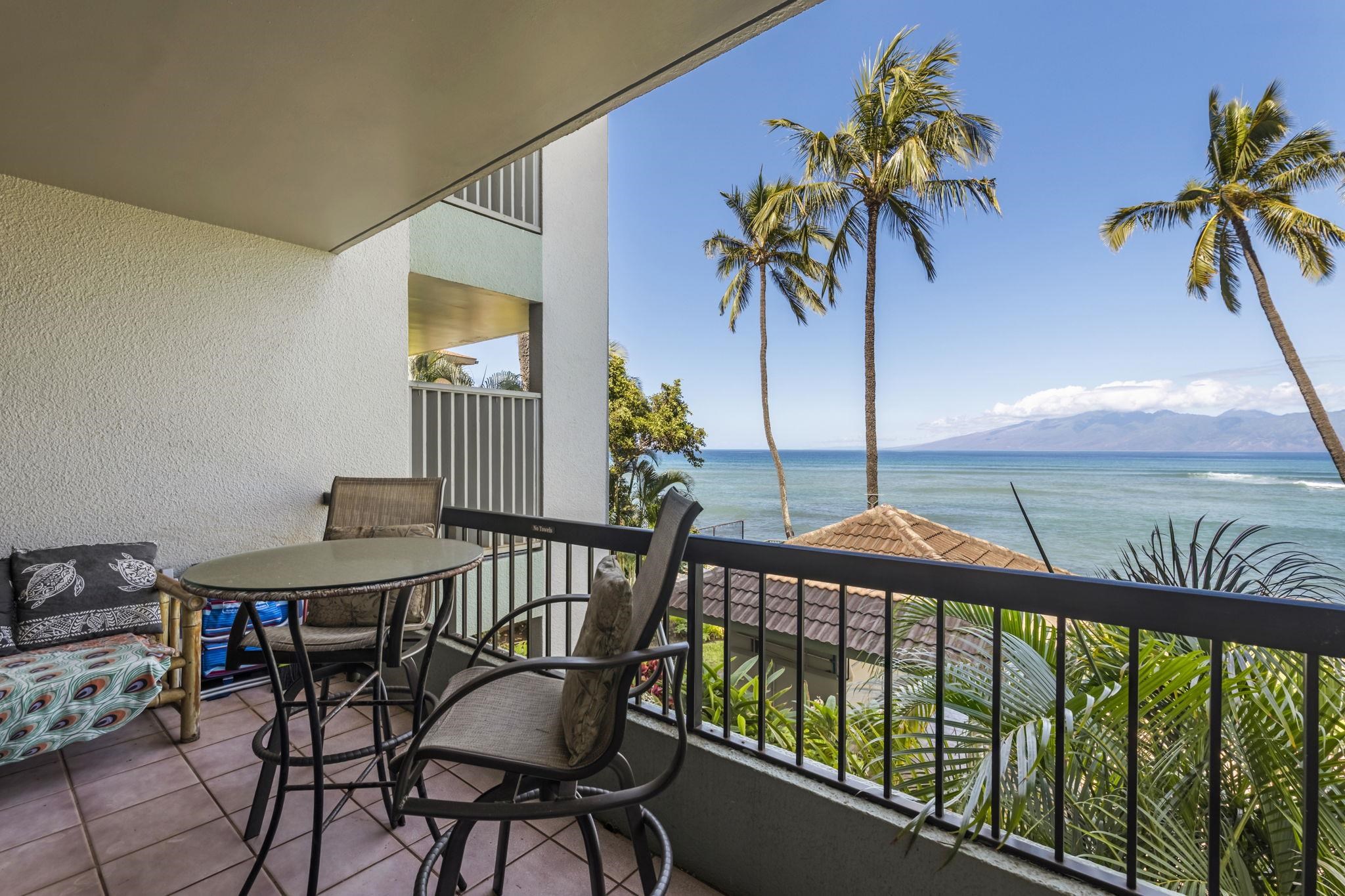 3875 Lower Honoapiilani Road, Unit B205 Lahaina, HI 96761 - Photo 19 of 28 a view of a balcony with furniture