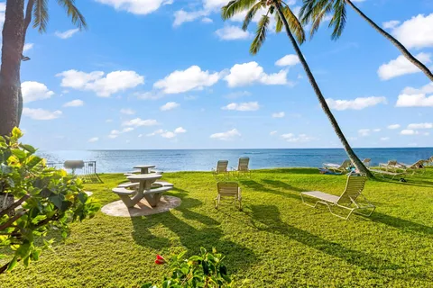 a view of a street with benches