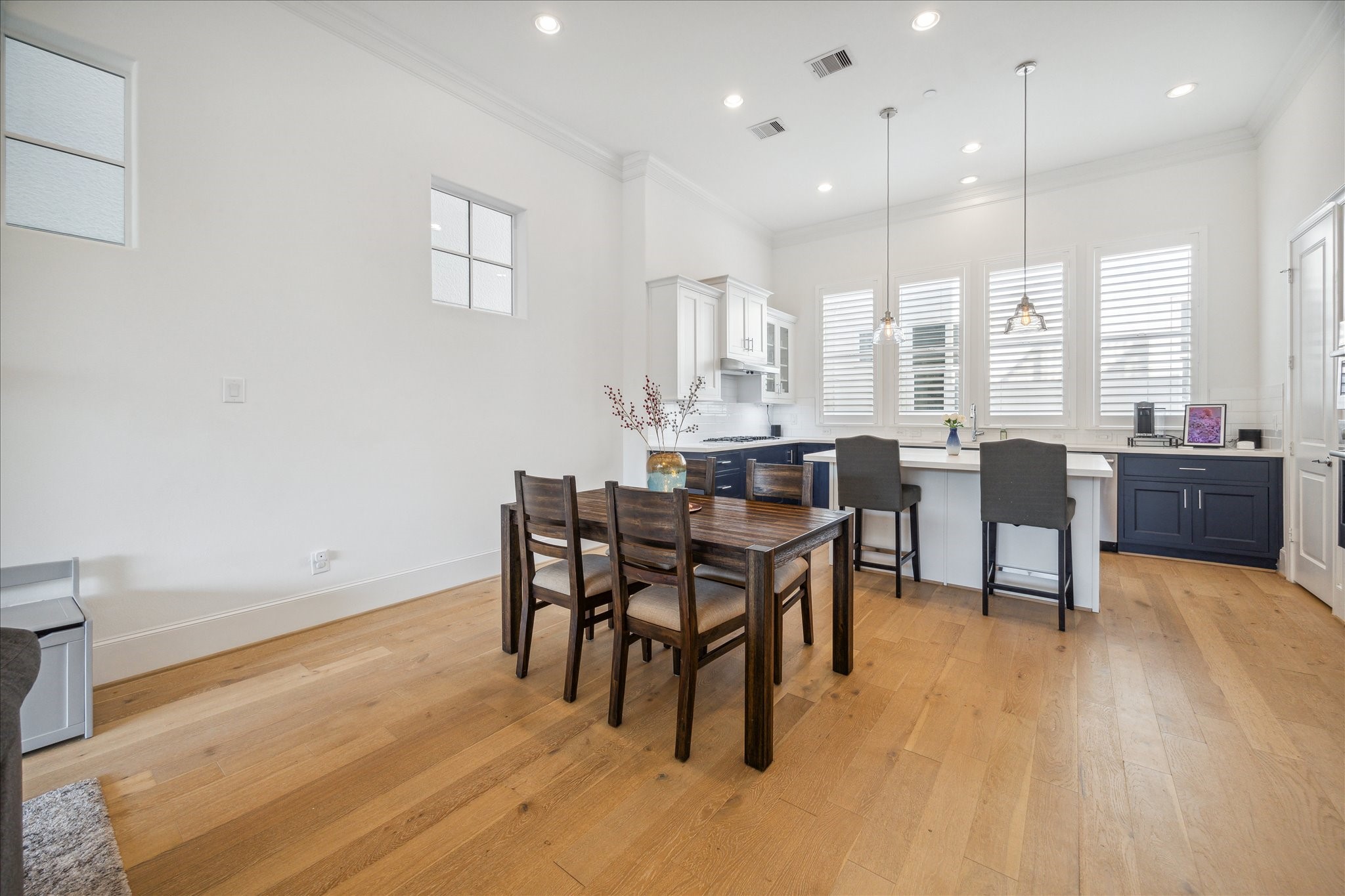2714 Harvard Street Houston, TX 77008 - Photo 13 of 31 a dining room with furniture and wooden floor