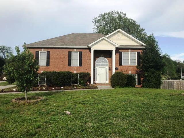 3591 Rabbit Run Trail Clarksville, TN 37043 - Photo 5 of 27 a front view of a house with a yard