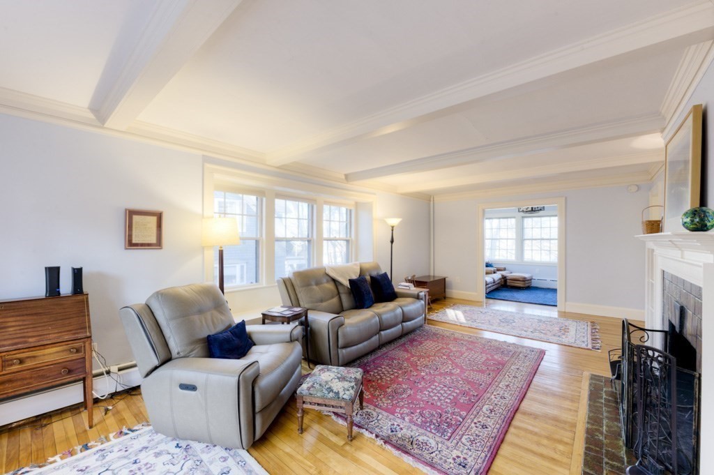 11 St Elmo Road Worcester, MA 01602 - Photo 6 of 34 a living room with furniture or couch and a fireplace