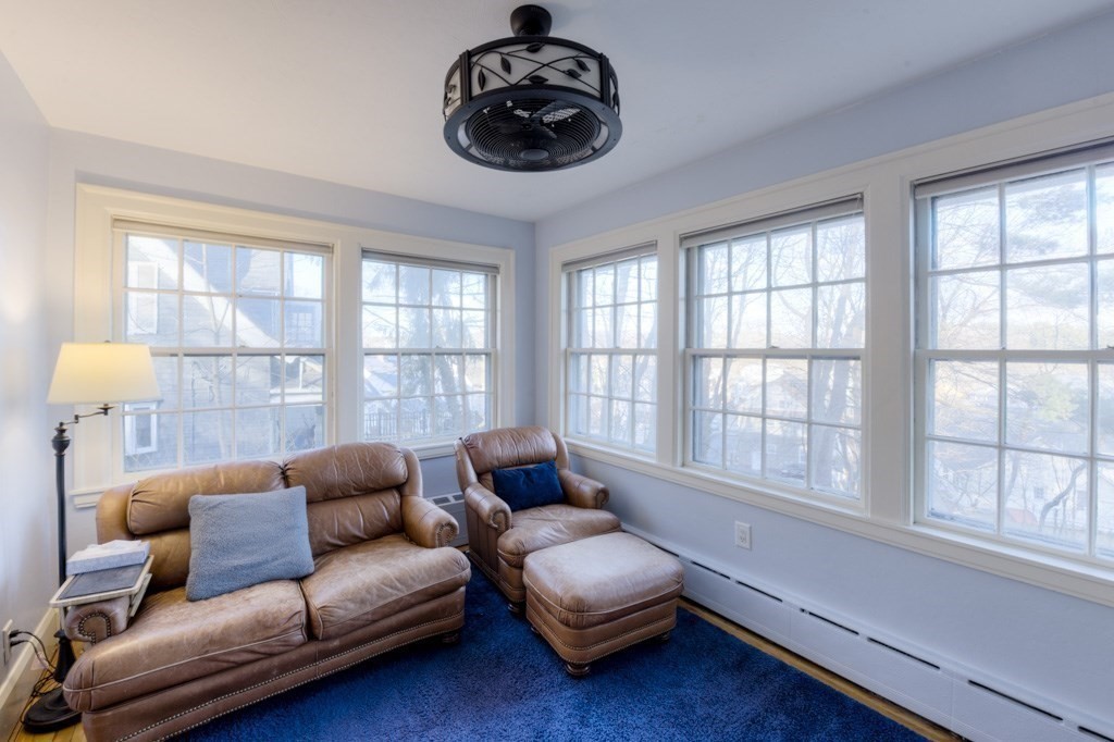 11 St Elmo Road Worcester, MA 01602 - Photo 8 of 34 a living room with furniture and a large window