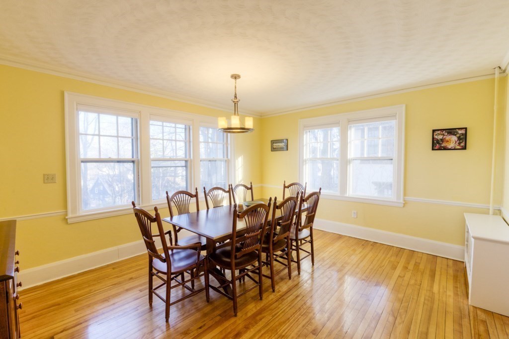11 St Elmo Road Worcester, MA 01602 - Photo 9 of 34 a view of a dining room with furniture and wooden floor