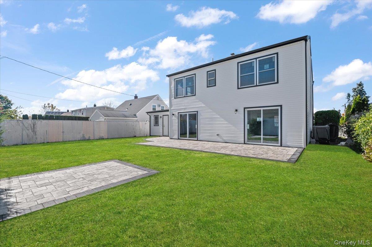 89 Ridge Lane Levittown, NY 11756 - Photo 34 of 44 a house view with a garden space
