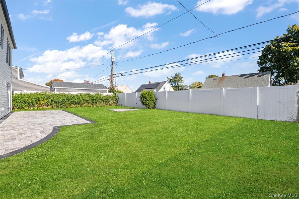 89 Ridge Lane Levittown, NY 11756 - Photo 35 of 44 a view of a backyard