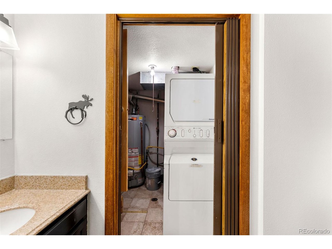 10500 Ryan Gulch Road, Unit J Silverthorne, CO 80498 - Photo 13 of 24 Utility Room off of 1/2 Bath