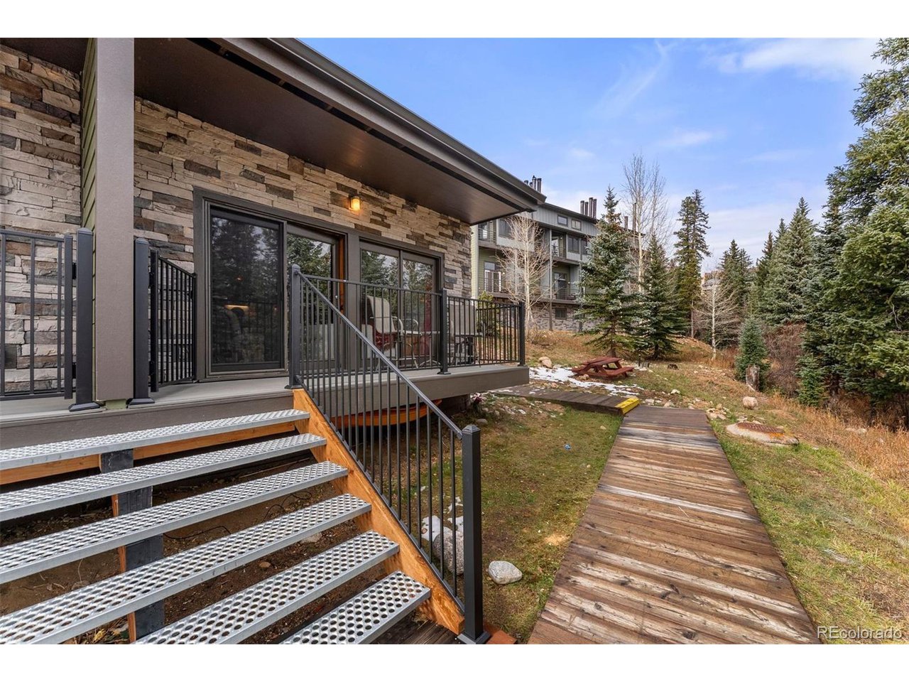 10500 Ryan Gulch Road, Unit J Silverthorne, CO 80498 - Photo 4 of 24 Rear Deck
