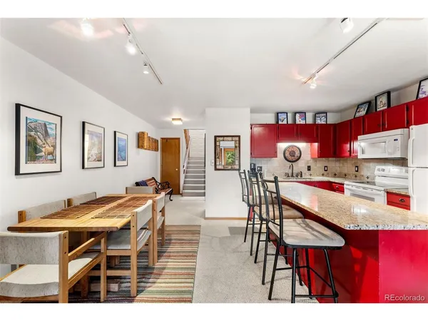 a view of a dining room with furniture