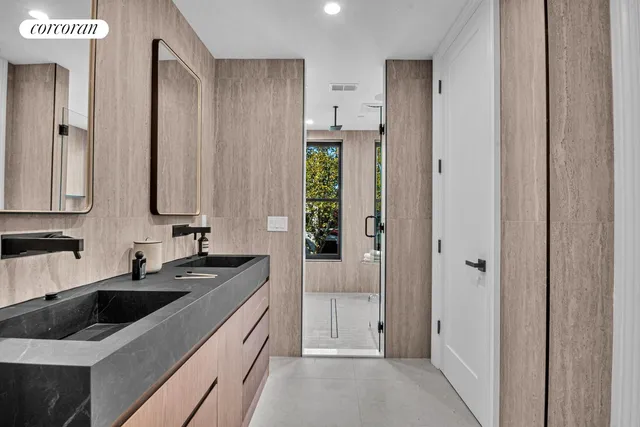 a kitchen with a sink and refrigerator