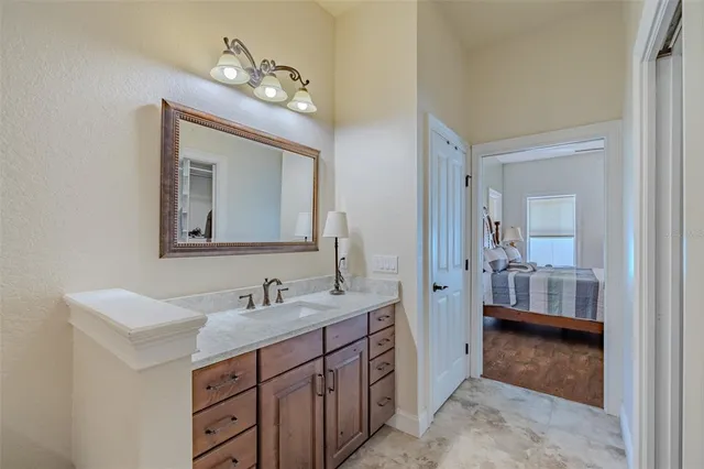 a kitchen with stainless steel appliances granite countertop a refrigerator sink and cabinets