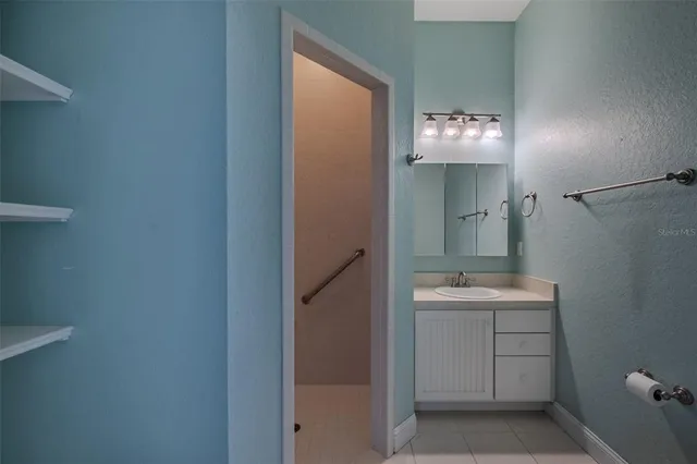 a view of a house with a yard and mountain