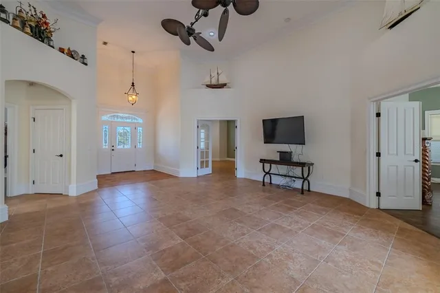 a view of a room with wooden floor and bathroom