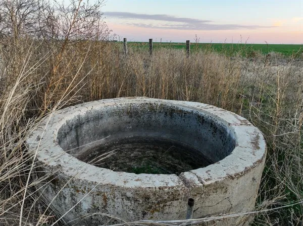 a view of a yard with an ocean view