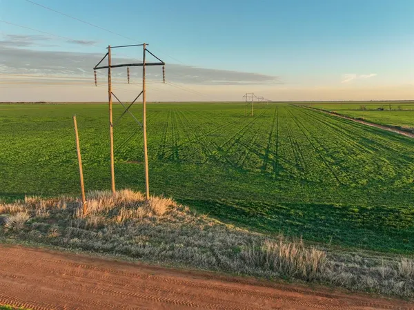 a view of a lake with a big yard